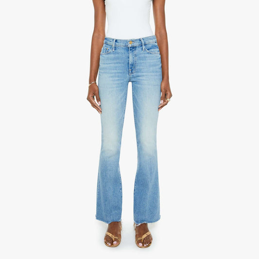 Mid-rise flare jeans with whiskering and fading, featuring a frayed hem and full length inseam, made with stretch denim.