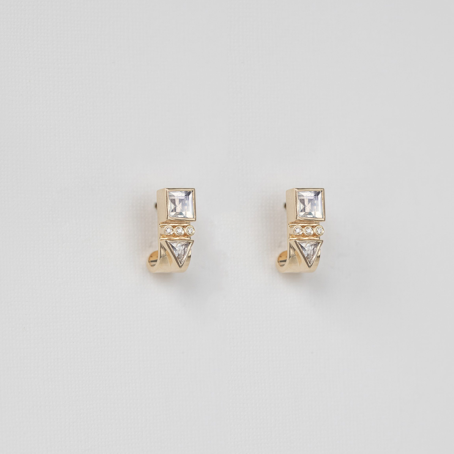 Solid 14k yellow gold with moonstones and diamonds (0.01ct) Studs with a half hoop Approximant length: 1cm These earrings are sold in a pair 1835091