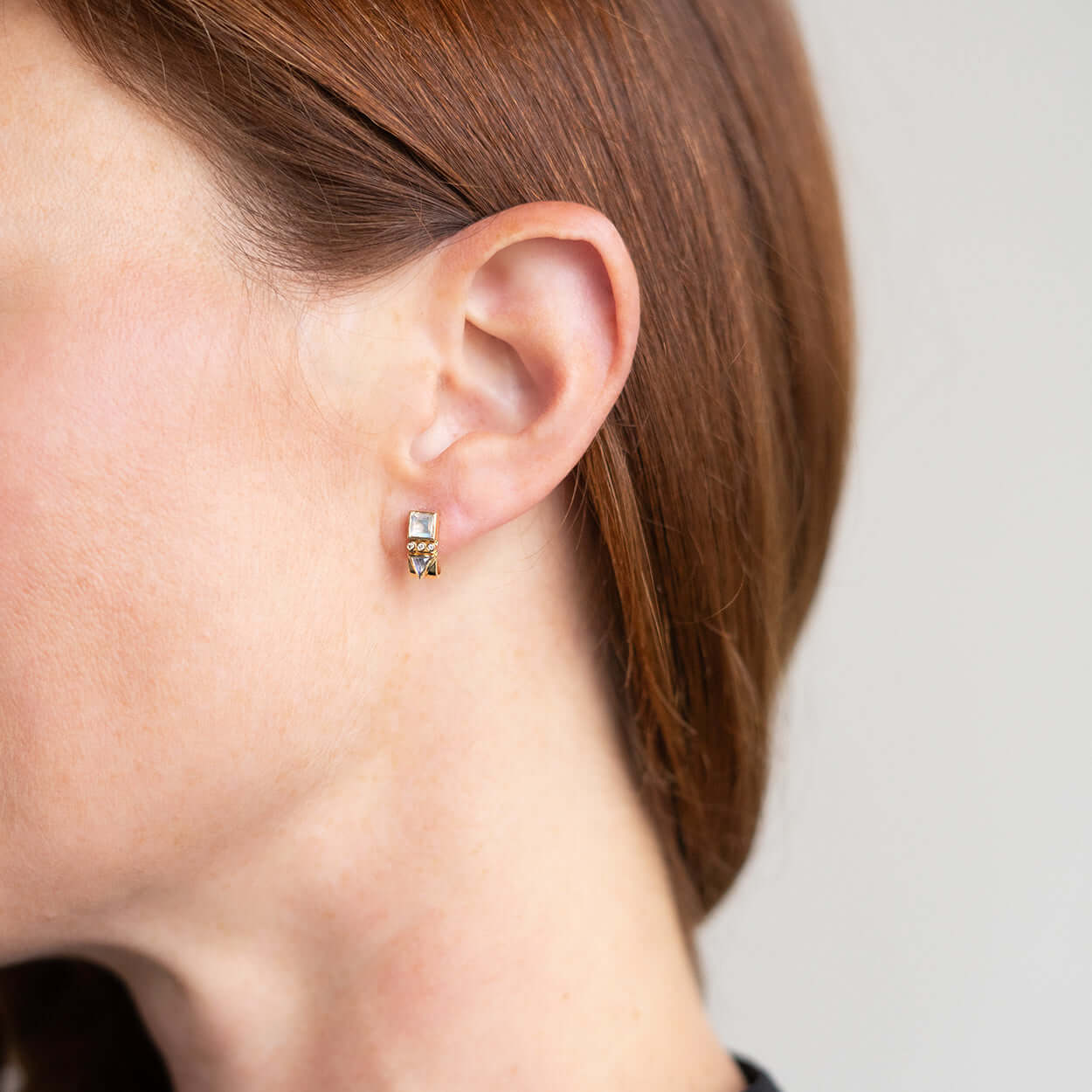 Solid 14k yellow gold with moonstones and diamonds (0.01ct) Studs with a half hoop Approximant length: 1cm These earrings are sold in a pair 1835091