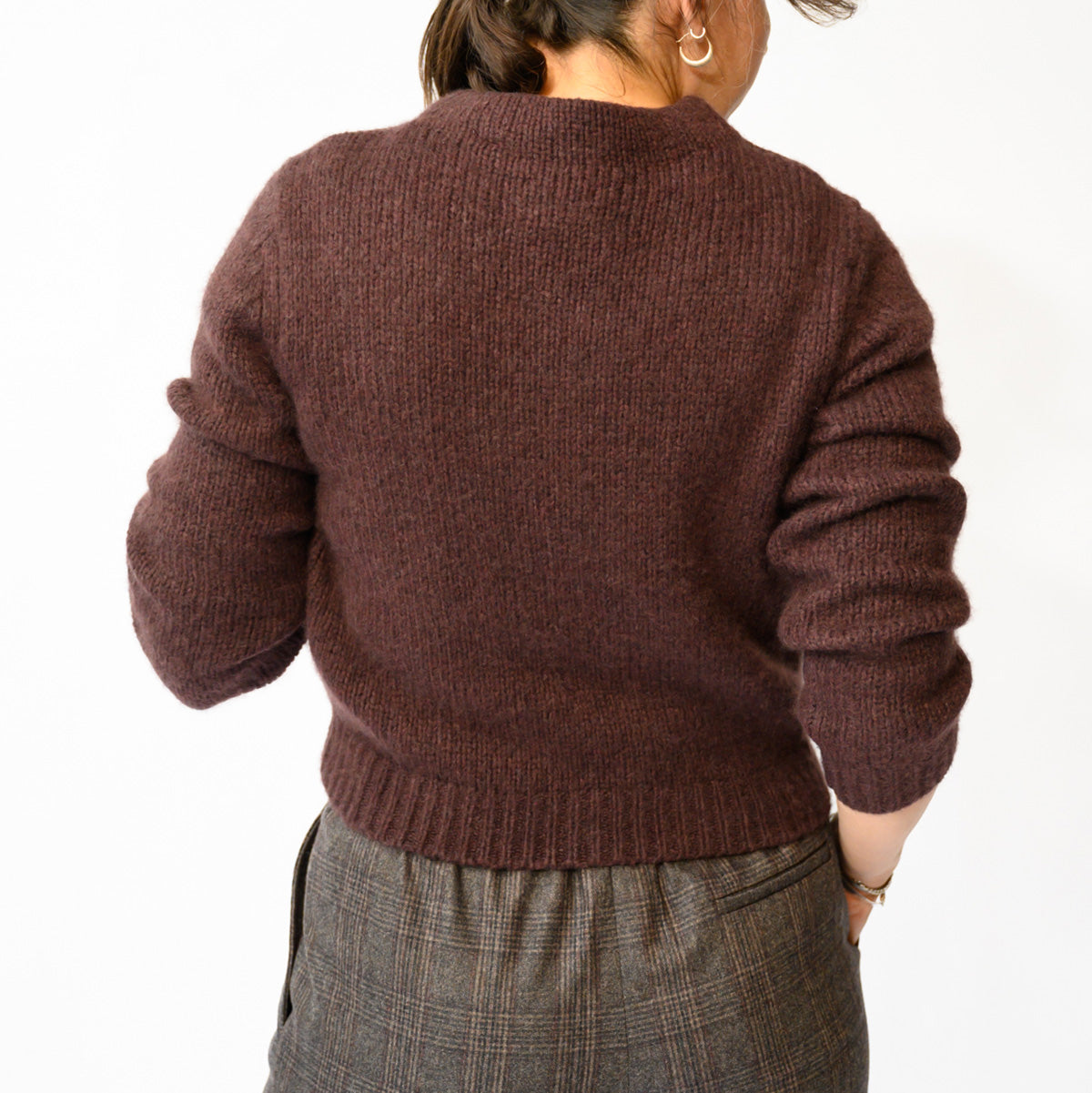 Maire Sweater in Red Umber featured in a fitted silhouette with blouson sleeves and ribbing detail.