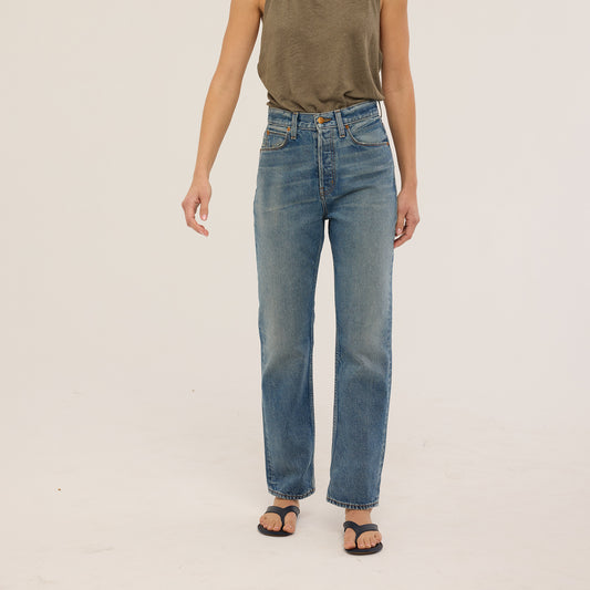 High-waisted Sunday Jean in Borrego Indigo, rigid denim, fitted through hips and seat, 100% cotton, made in USA.