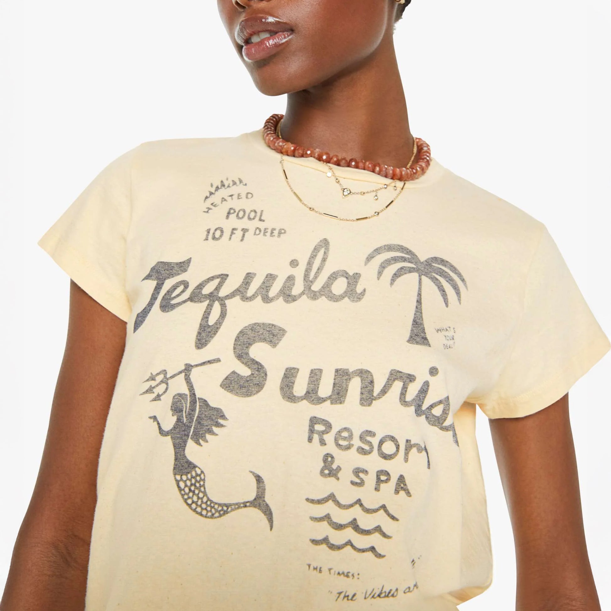 Female model wearing Boxy Goodie Goodie crewneck tee with vintage Tequila Sunrise graphic, made in Los Angeles.