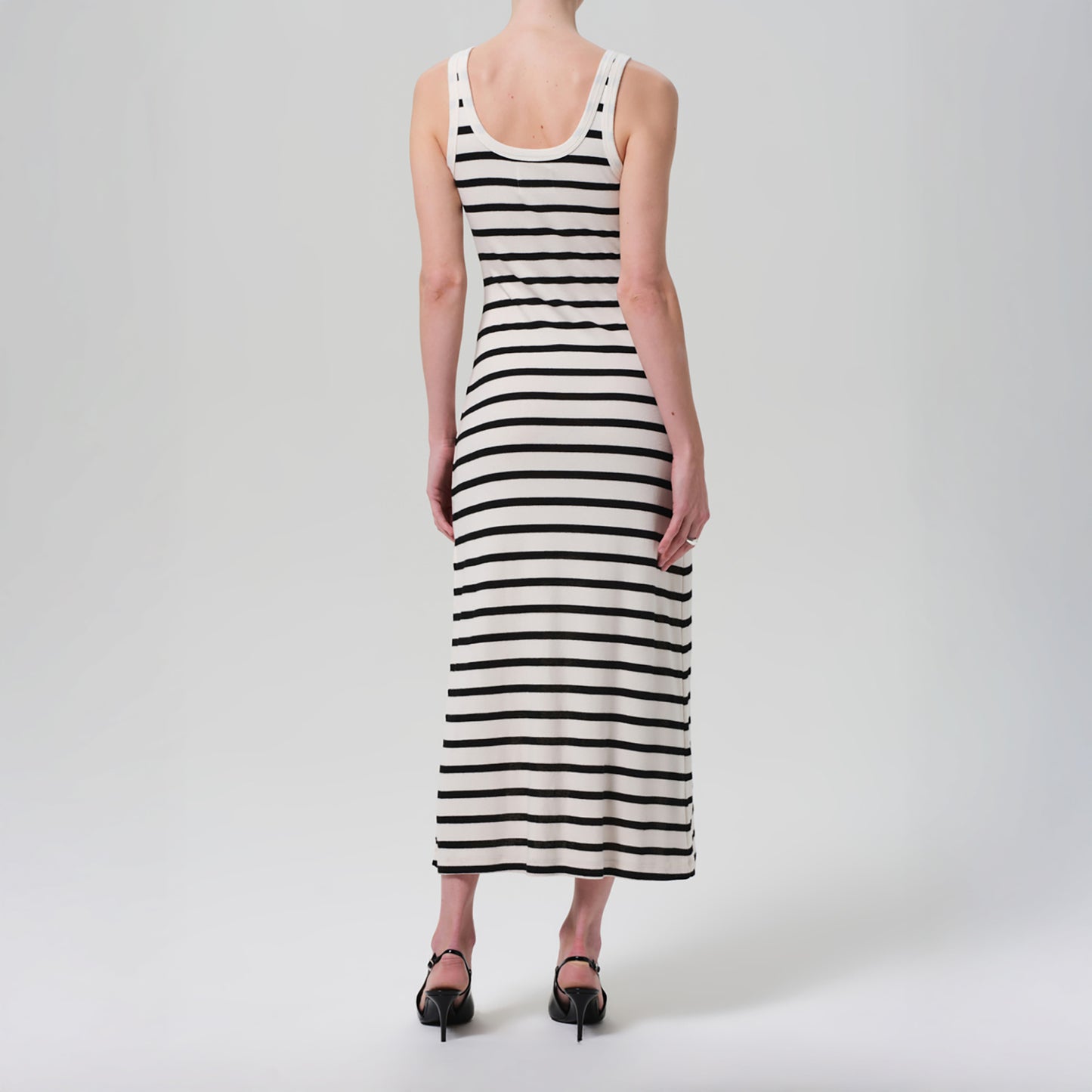 Back view of the Faye Tank Dress in Midnight Stripe, featuring cream and navy stripes and a scoop neck design.