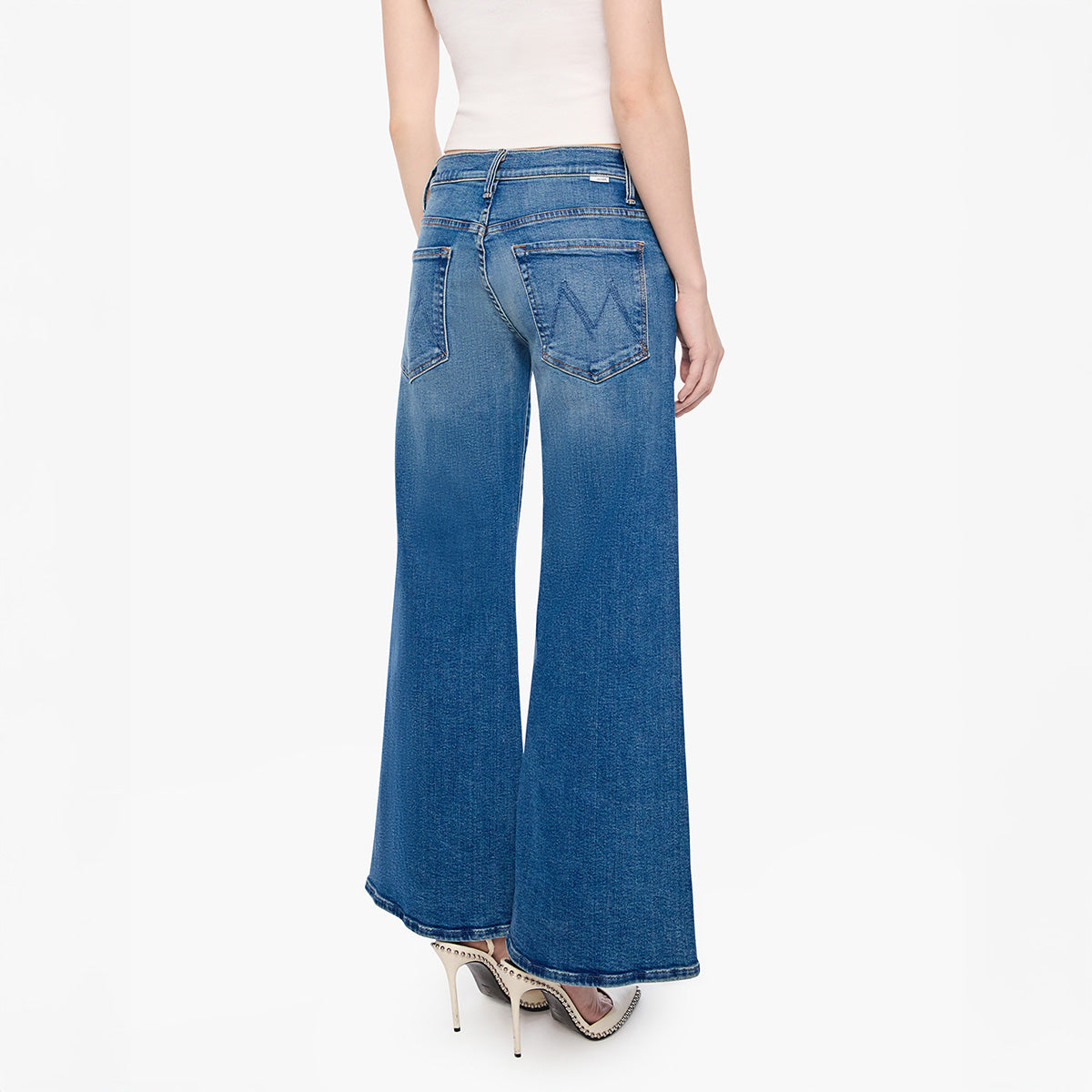 Lil Mid Rise Sidestepper in Strike It Rich rear view of mid-rise relaxed fit jeans with wide flares.