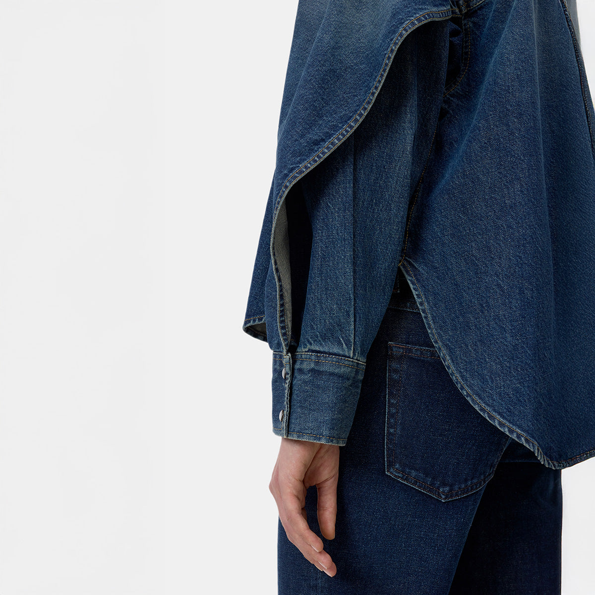 Side view of Overlay Detail Shirt in Dark Blue showcasing flap sleeves and relaxed fit, perfect for casual style.