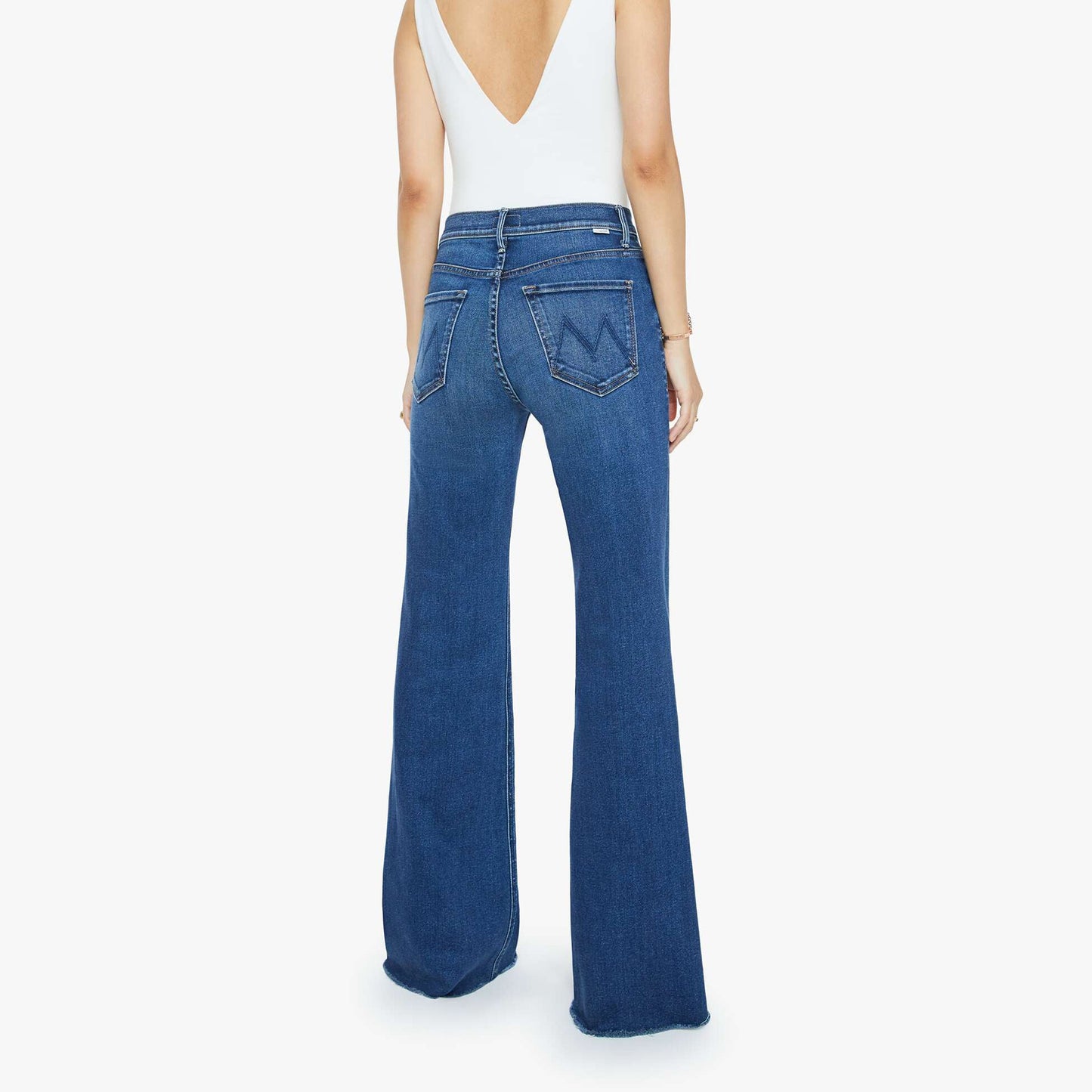 Back view of Lil Doozy Fray high-rise flare jeans in Scorchin' Hot, featuring a frayed hem and stylish design.