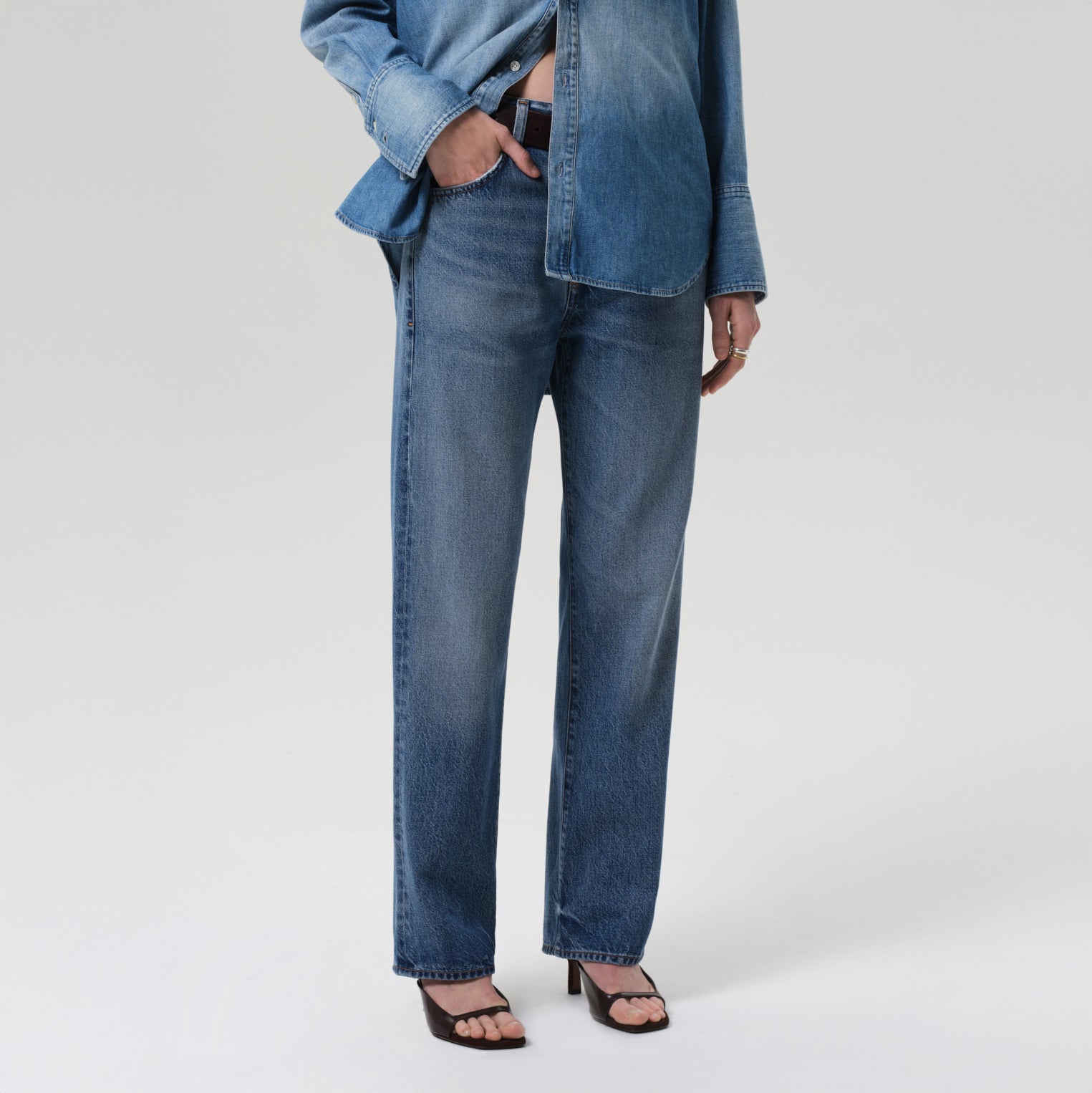 Woman wearing Baretta Straight Leg Jean in Jete, high rise vintage-inspired fitted denim with relaxed straight leg.