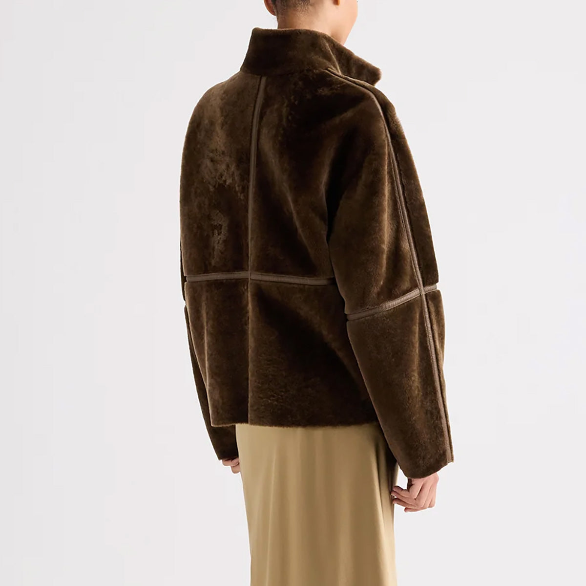 Big Sky Jacket in Kangaroo, back view showcasing soft, rich brown merino lamb shearling fabric and stand collar.