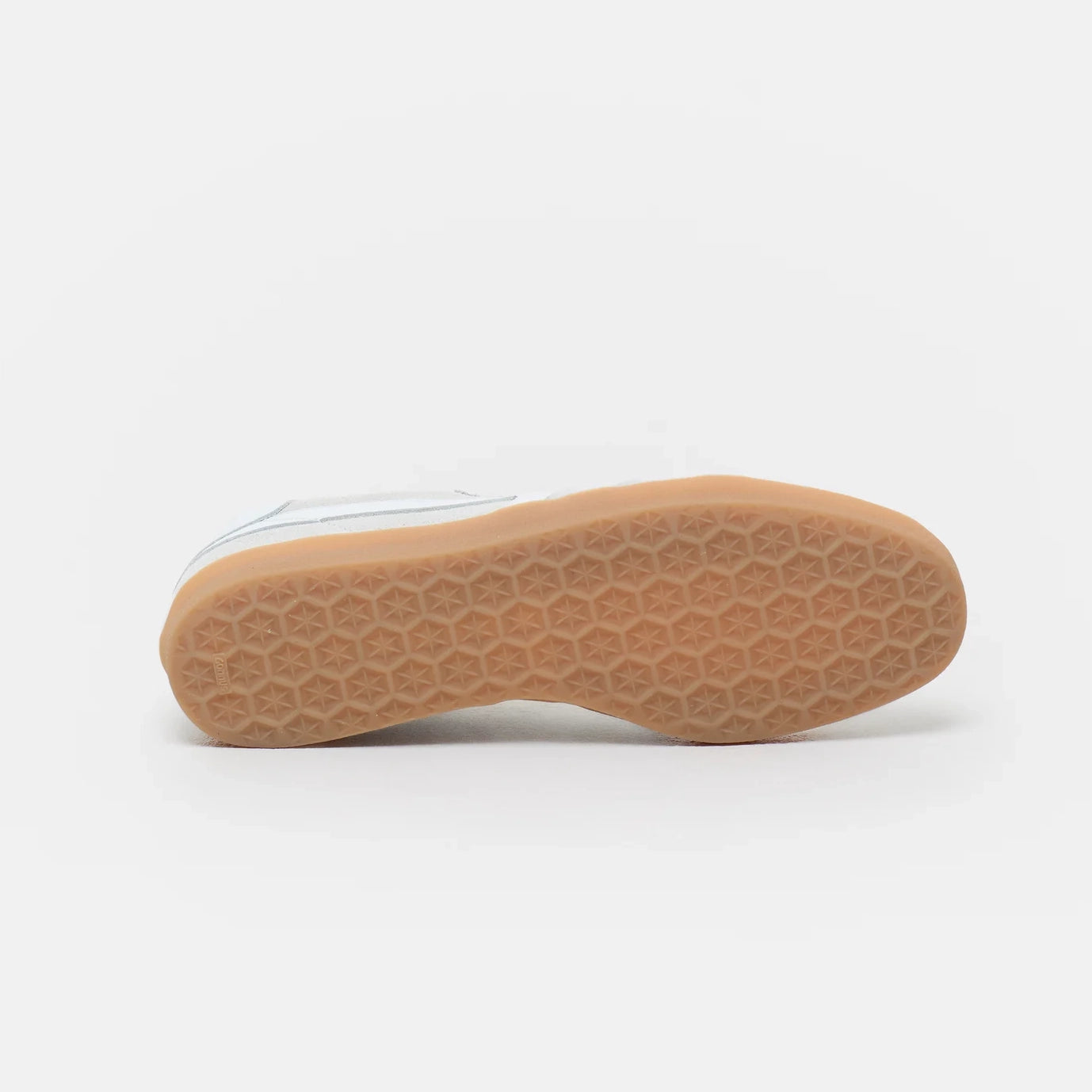 Sole of the Slim Sneaker in White, featuring a honeycomb pattern and made from durable rubber.