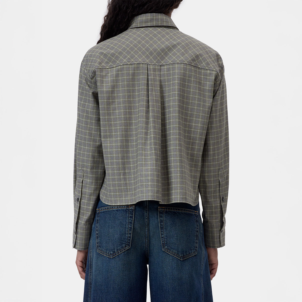Back view of Crop Oversize Shirt in Juniper Green with plaid pattern and relaxed fit, showcasing cropped length and button details.