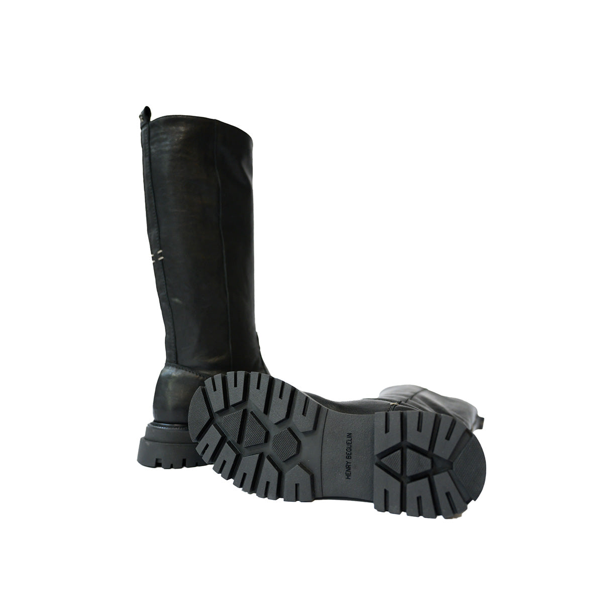 Emily Boot in Black tall leather boot with lug sole and rubber sole, styled below the knee.