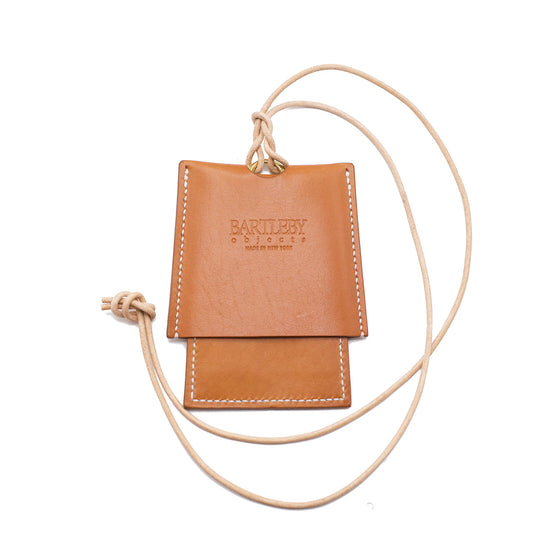 Handcrafted saddle leather card lanyard with 4 slots and adjustable cord, made in NYC by Bartleby Essentials.