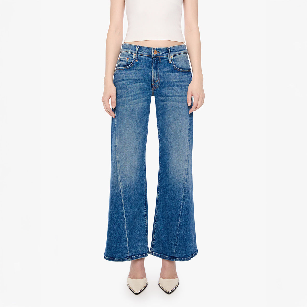Front view of Lil Mid Rise Sidestepper in Strike It Rich, relaxed fit straight-leg jeans paired with stylish heels.