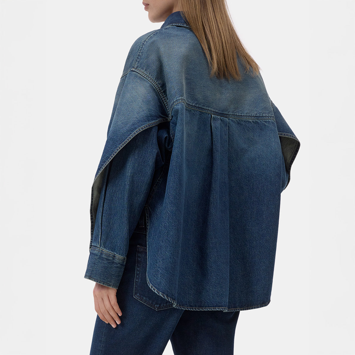 Overlay Detail Shirt in Dark Blue, relaxed fit snap front blouse, back view showcasing overlay sleeve detail.