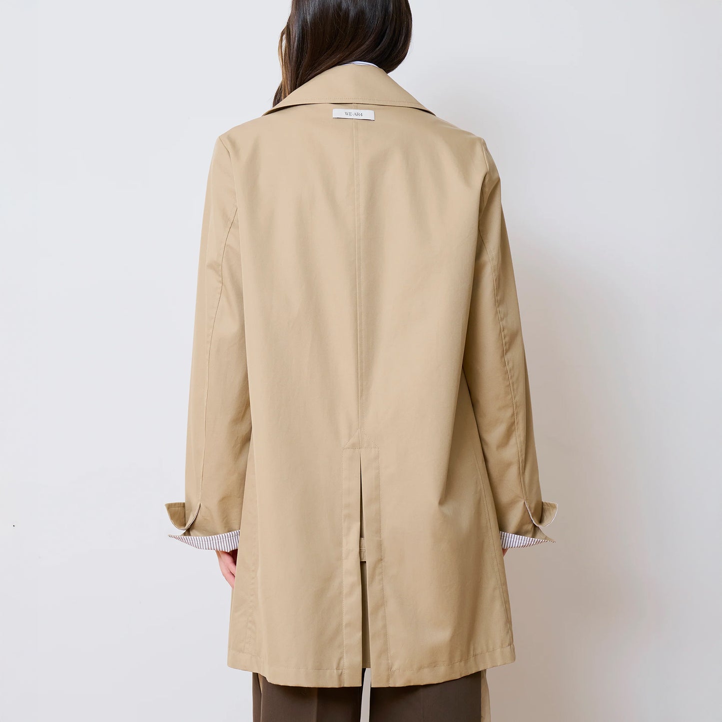 The Shift Raincoat in Sand