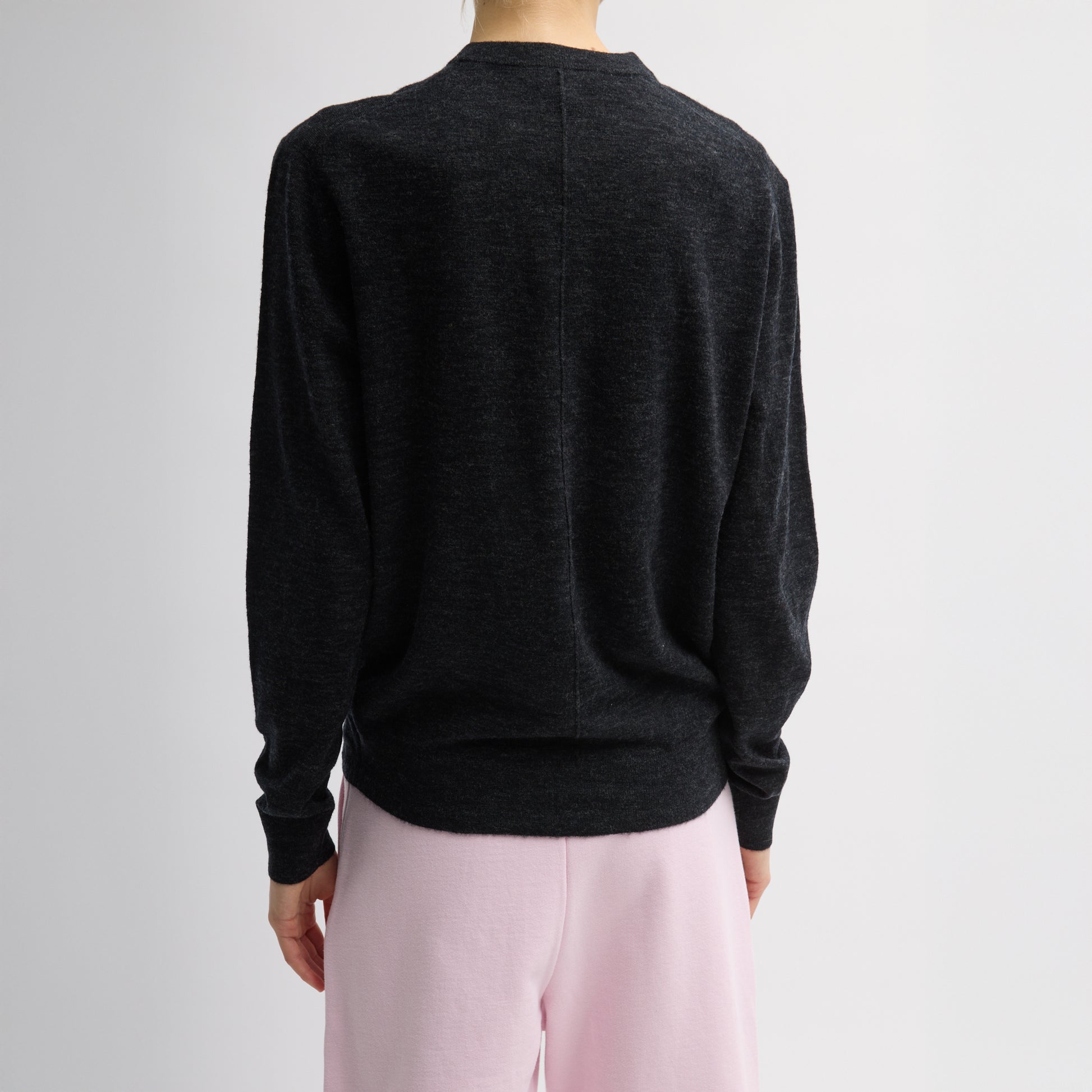 Crewneck sweater with front and back center seam details. Ribbing at neckline, cuffs and hemline. Mercerized Wool: 60% wool, 40% polyamide T000SM6528