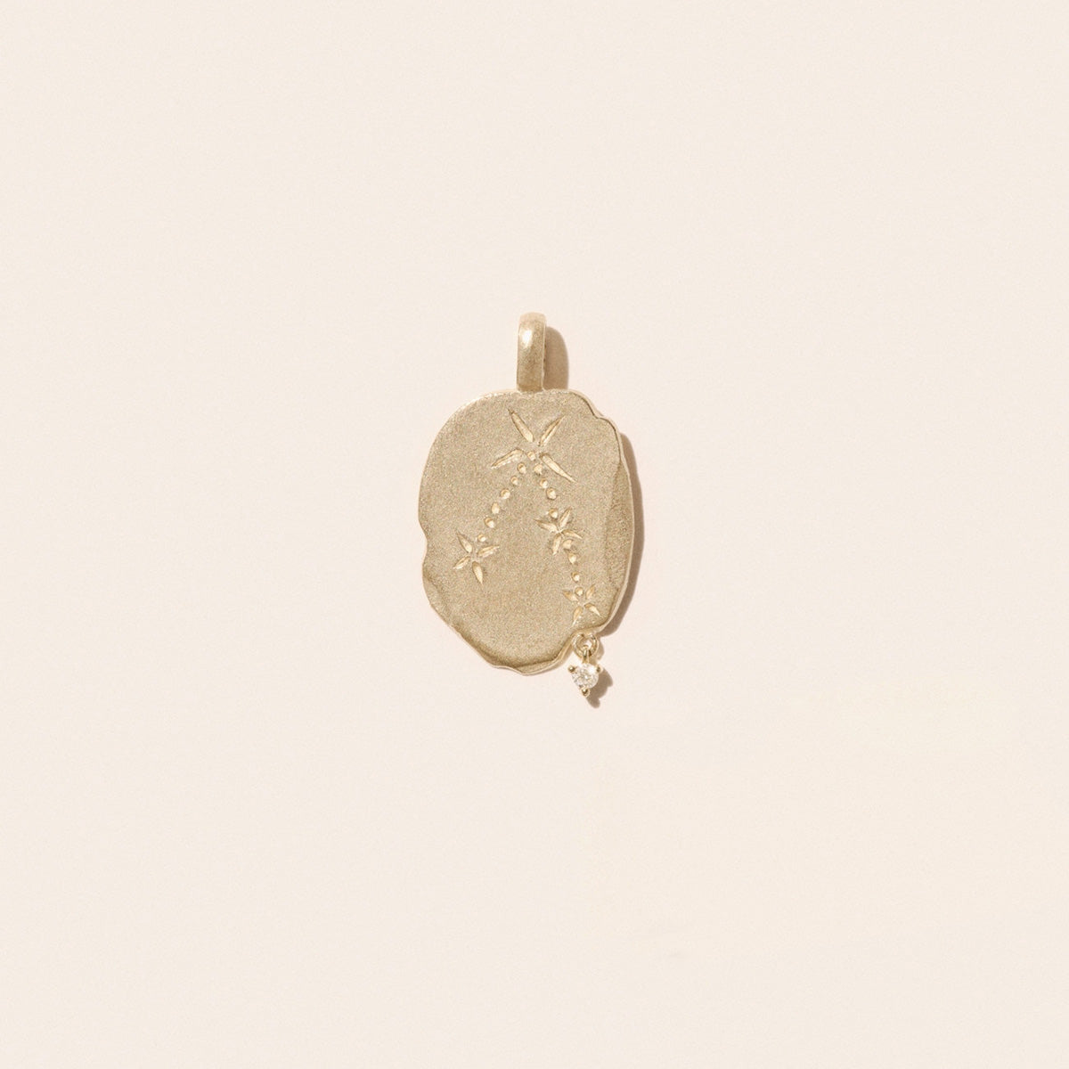 Taurus Pendant in 9K Yellow Gold featuring constellation engraving with suspended diamond, made in France.