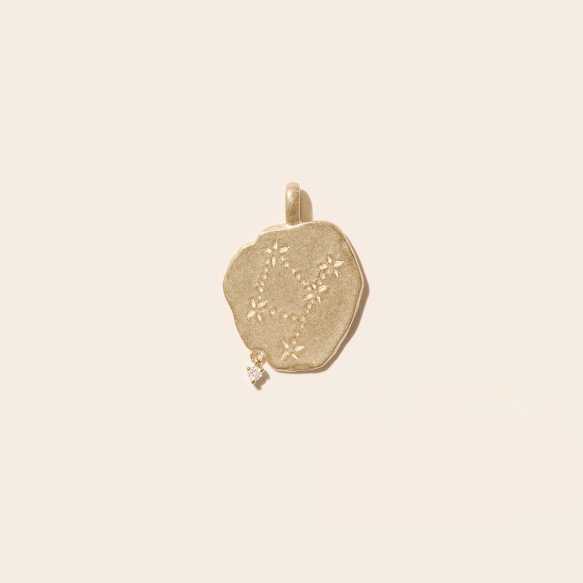 Virgo Pendant in 9K Yellow Gold, slightly irregular design with diamond, engraved constellation.