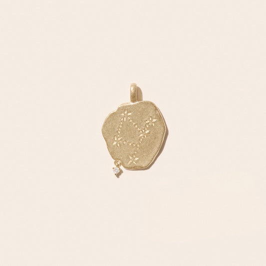 Virgo Pendant in 9K Yellow Gold, slightly irregular design with diamond, engraved constellation.