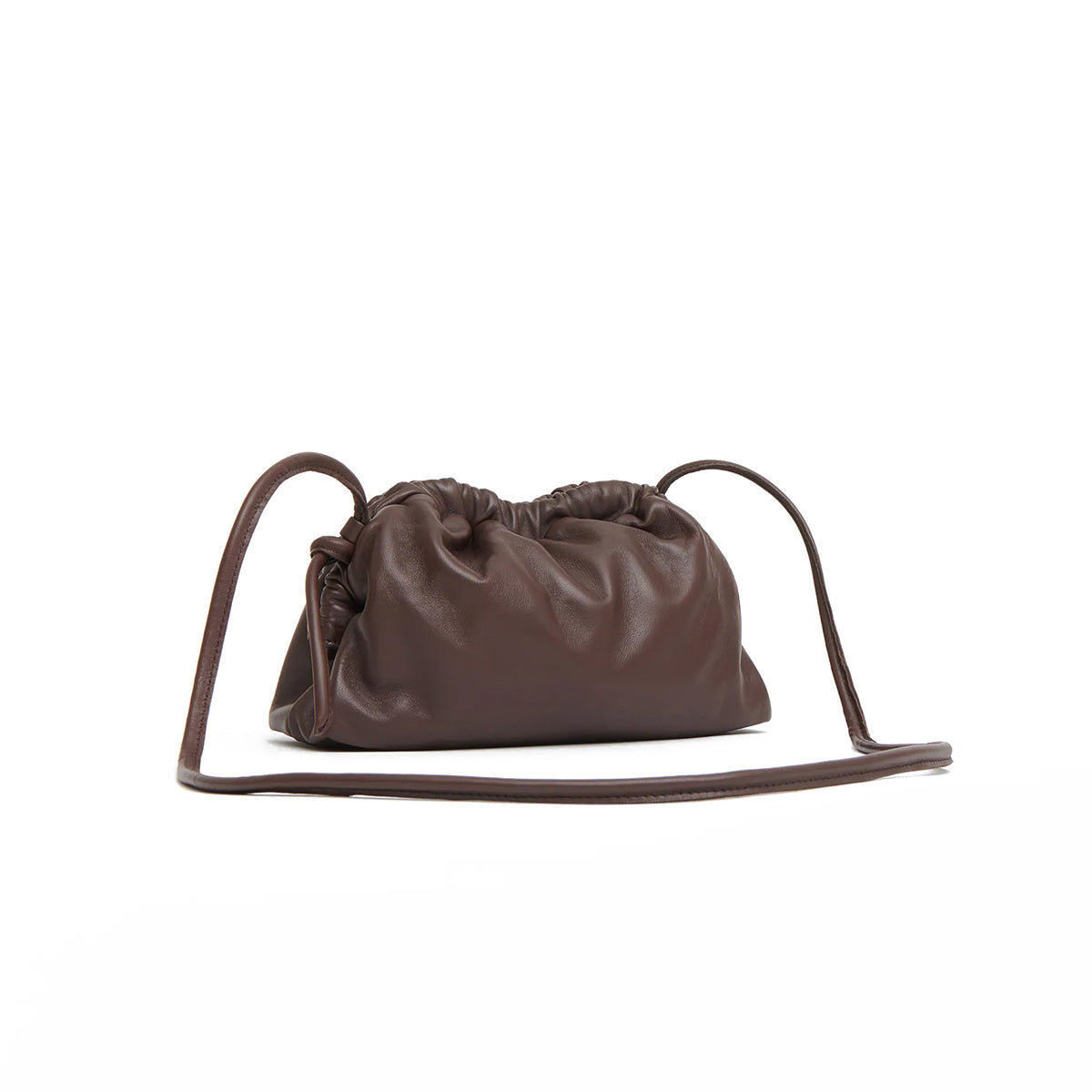 Mini Cloud Clutch in Chocolate showcasing a sculptural design with a curved frame and removable strap.