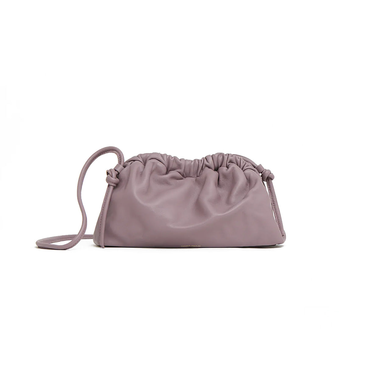 Mini Cloud Clutch in Uva leather bag with a curved frame and removable strap.